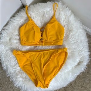 I selling a two piece yellow bikini swim suit!